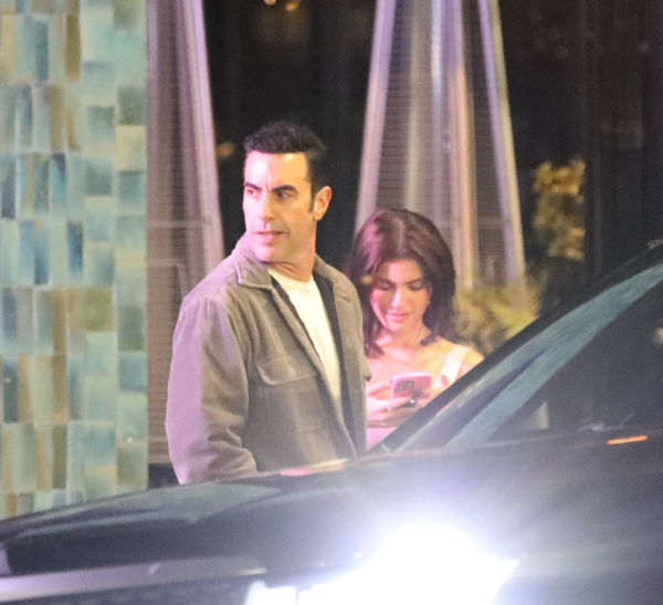 Sacha Baron Cohen cozies up to influencer half his age for club outing1